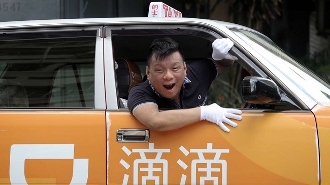 Từng khiến Uber phải quy hàng, 'vua gọi xe' Trung Quốc sẽ dùng lá bài nào cho Grab Việt Nam?