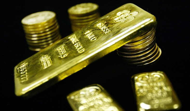Fed "kiềm chân" vàng quay lại ngưỡng 1.300 USD/oz