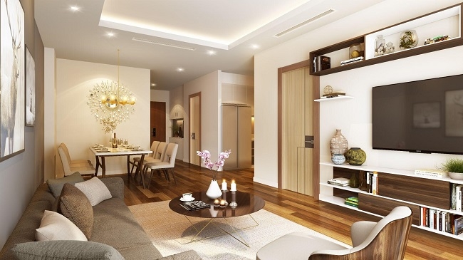 Nội thất trong căn hộ sử dụng những gam màu nâu gỗ, ghi nhạt, xám trắng vừa thân thiện với môi trường vừa hiện đại, sang trọng. Ảnh: TL.